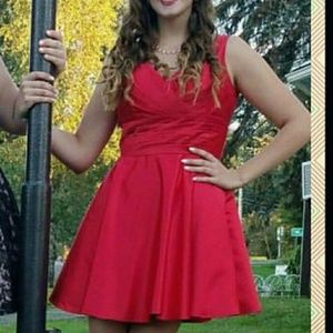 Beautiful "V" neck red homecoming dress.